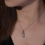 DATURA - ASTRA - Halskette besetzt mit Diamanten und einem Rubin
